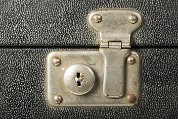 Image showing Lock of an old travel suitcase