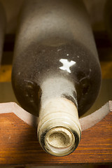 Image showing Wine bottles on shelf