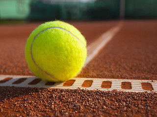 Image showing Yellow ball on the court ground