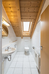 Image showing White tiled restroom