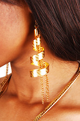 Image showing Closeup of gold earring.