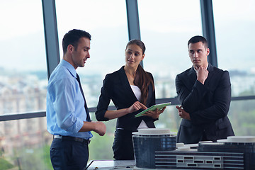 Image showing business people and engineers on meeting