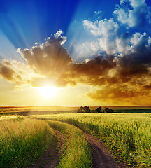 Image showing good sunset over rural road