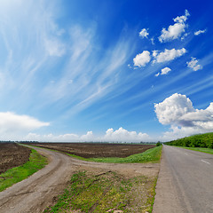 Image showing two rural road  under cloudy sky