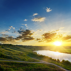 Image showing dramatic sunset over river