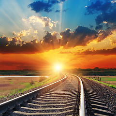 Image showing dramatic sunset over railroad