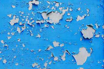 Image showing cracked blue paint surface as grunge background