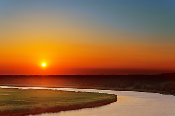 Image showing red sunset over river