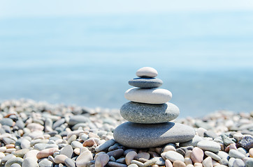 Image showing stack of zen stones on beach