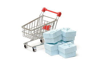 Image showing Shopping cart with cyan gift boxes 