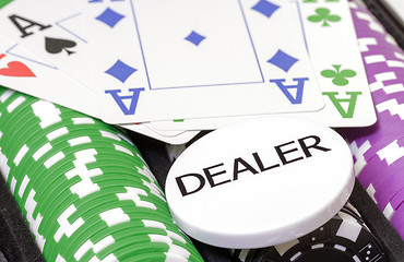 Image showing Set of poker chips, cards and dealer button