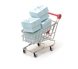Image showing Shopping cart with cyan gift boxes 