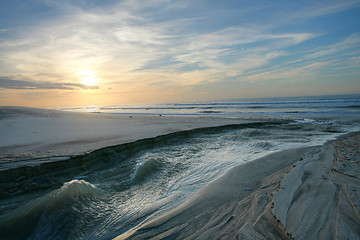 Image showing seascape in twilight.  Sea joining with the lake.