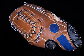 Image showing baseball glove on black 