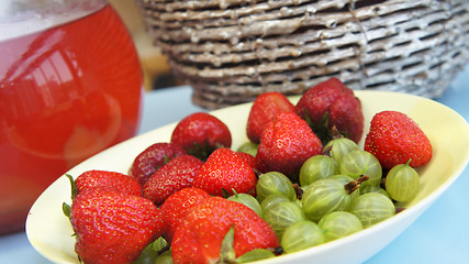 Image showing Fresh juicy strawberry and gooseberry 