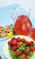 Image showing Fresh juicy strawberry and gooseberry 