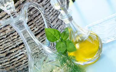 Image showing Olive oil and herbs