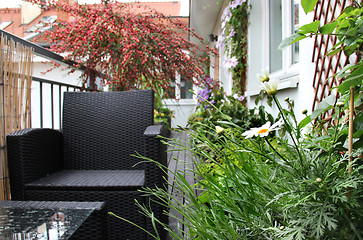 Image showing Modern terrace with a lot of flowers