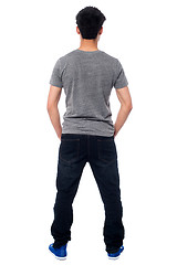 Image showing Rear view of a man in casuals, full length shot