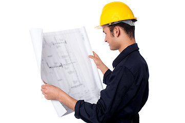 Image showing Construction worker reviewing plan