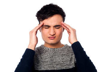 Image showing Young guy having headache