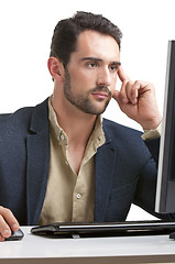 Image showing Man Looking At A Computer Monitor