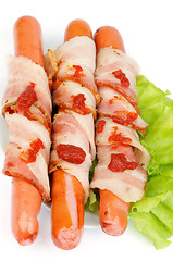 Image showing Sausages Wrapped in Bacon