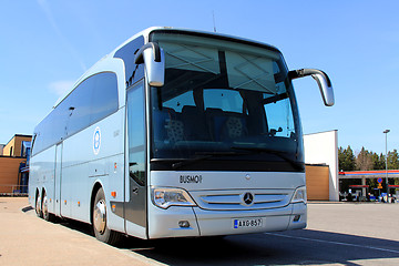 Image showing Blue Mercedes Benz Bus on a Bus Stop