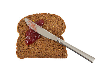 Image showing Slice of brown bread with jam 