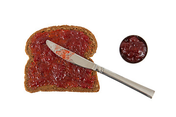 Image showing Slice of brown bread with jam 