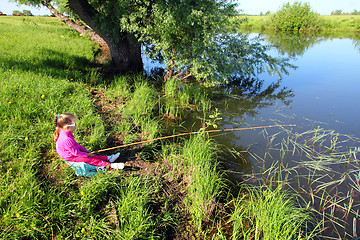 Image showing fishing littlle girl on pond