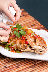 Image showing Food Stylist Plating Fish