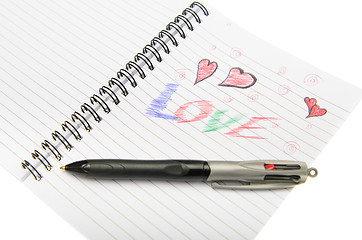 Image showing Love Written in Notebook With a Pen.