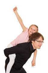 Image showing Father giving piggyback ride to his daughter