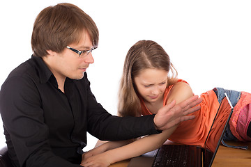 Image showing Dad hides laptop to his daughter