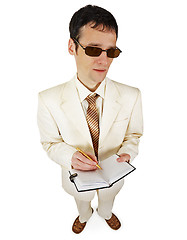 Image showing Man in a light suit with a notebook on white background