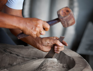 Image showing Hands woodcarver with the tools