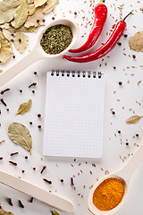 Image showing Spices, notebook, red chili pepper