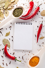 Image showing Spices, notebook, red chili pepper