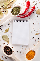 Image showing Spices, notebook, red chili pepper