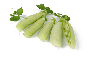 Image showing fresh green peas isolated on a white background