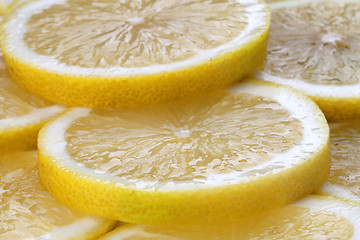 Image showing slices of fresh lemon on full screen