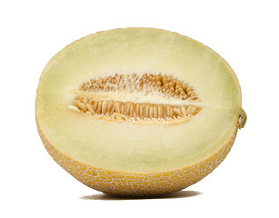 Image showing Half a honeydew melon on a white background.