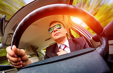 Image showing Man driving a car.
