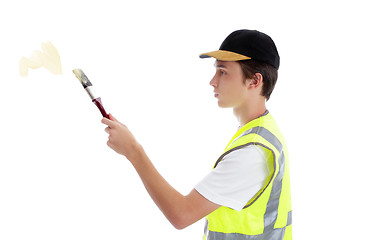 Image showing Painter handyman applying paint