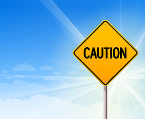 Image showing Caution on blue sky background