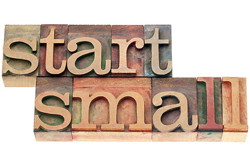 Image showing start small in wood type