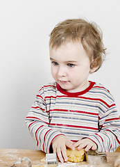 Image showing young child making cookies