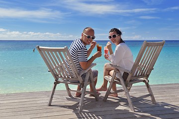 Image showing happy young couple relax and take fresh drink