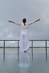 Image showing young woman relax on cloudy summer day